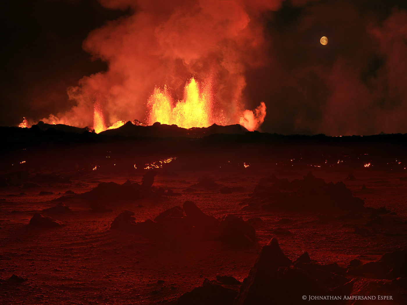 Red glow at night on the ground from the nearby Holuhraun volcanic eruption (natural colors)